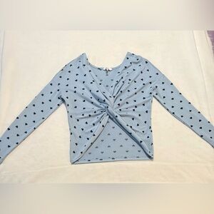 Light blue with black heart print long sleeve twisted crop top